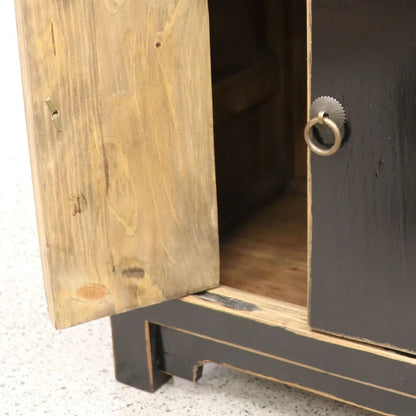 Wooden cabinet with one door open, showing a natural wood interior.