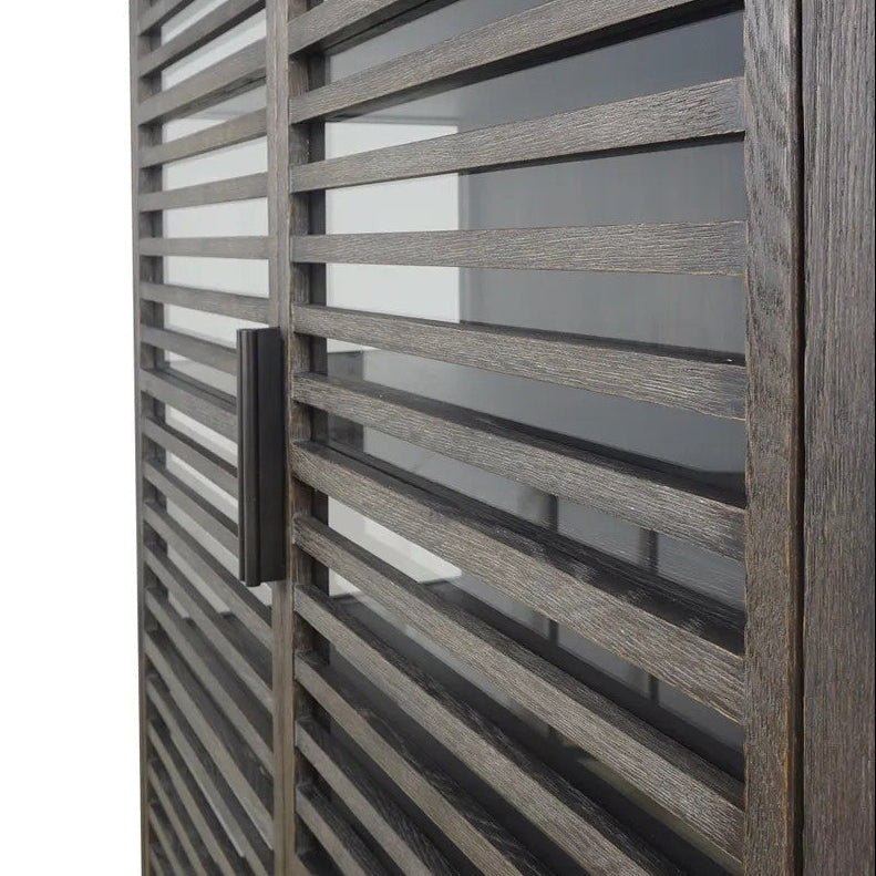 Close-up of a modern wooden slatted doors with dark metal horizontal battens and a vertical dark handle, shown against a white background.