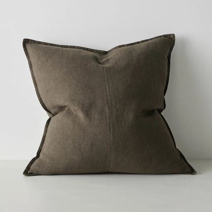 Brown pillow on a light gray background