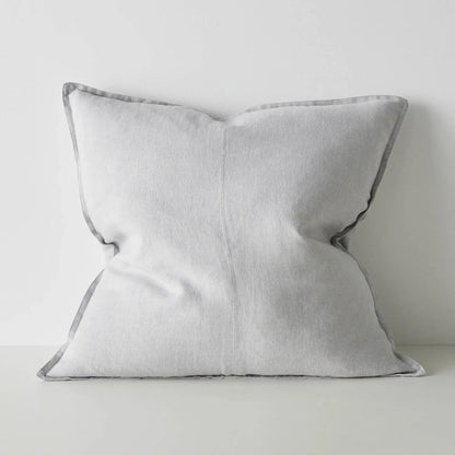 Light grey cushion on a light grey background