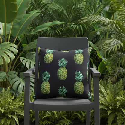 Pillow with pineapple pattern on a plain background