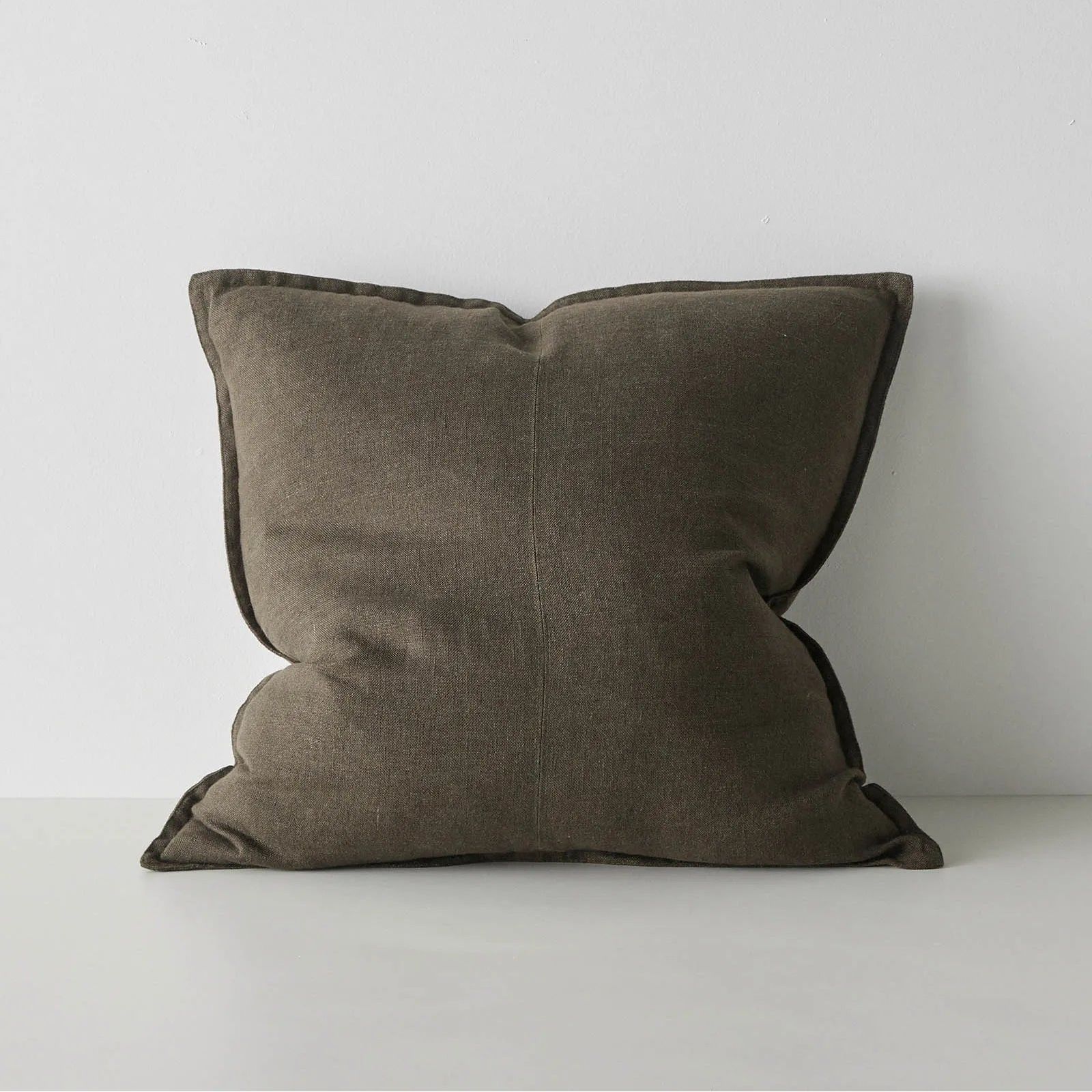Brown pillow on a white background
